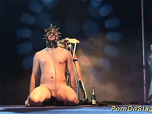 mischievous fetish needle show on stage